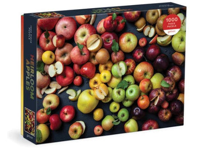 A jigsaw puzzle box featuring a photo of lots of different apples.