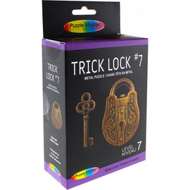 Trick Lock #7 by Puzzle Master is a challenging metal mechanical puzzle displayed in its colorful packaging. The box features an intricately designed padlock and key illustration, indicating its difficulty level of 7, suitable for puzzle enthusiasts seeking an intriguing escape experience.