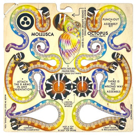 A DIY kit titled 'Mollusca: Octopus Rainbow' by JCR Work. The kit features colorful and intricate designs of octopus arms and body parts, with instructions for assembly. The punch-out pieces include vibrant illustrations of the octopus, encouraging creativity in how to attach the arms.