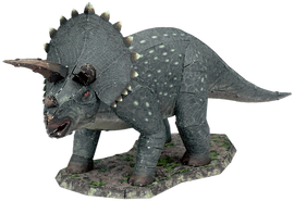 A detailed DIY kit model of a Triceratops by Fascinations. The model features intricate textures and realistic elements, showcasing the dinosaur's iconic three horns and frill.