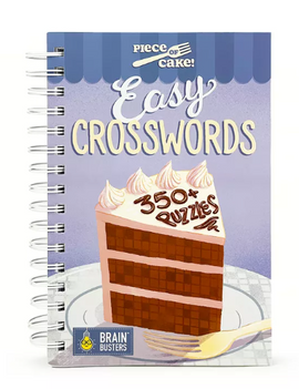 Piece of Cake Easy Crosswords by Cottage Door Press features a colorful cover illustrated with a slice of chocolate cake and the text '350+ Puzzles'. It is a spiral-bound book designed for crossword enthusiasts looking for easy and enjoyable puzzles.