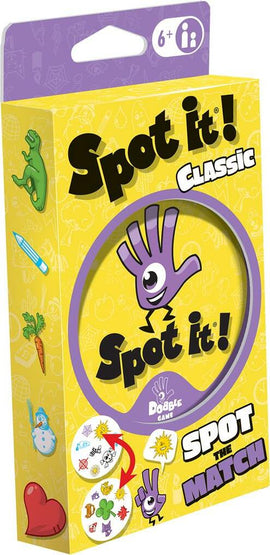 Spot It! Classic game by Zygomatic featuring a colorful box design. The packaging showcases the game title on a vibrant yellow background with playful illustrations of objects and a friendly character. Suitable for ages 6 and up, this engaging card game challenges players to spot matching symbols quickly.
