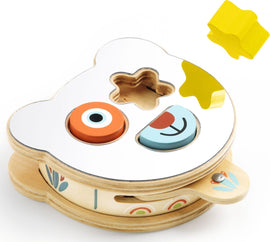 Colorful wooden sorting toy by DJECO, designed for infants. The toy features a playful bear shape with a reflective surface and various shaped colorful pieces, including an orange circle, blue semi-circle, and yellow star. Ideal for developing fine motor skills and shape recognition in young children.