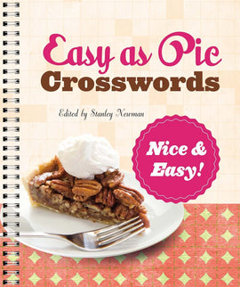 Cover of the book 'Easy as Pie Crosswords' edited by Stanley Newman. The title features playful, bold typography on a light grid background. A slice of pecan pie topped with whipped cream is displayed on a white plate, accompanied by a fork, set against a patterned surface.