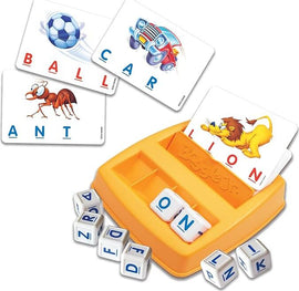 Boggle Jr. game by Winning Moves, featuring a colorful plastic base with letter dice and illustrated cards showing words like 'Ball', 'Car', 'Ant', and 'Lion'. This engaging learning game includes an assortment of letter cubes for children to form words based on the images on the cards, promoting vocabulary and spelling skills.