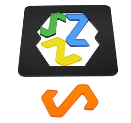 The Zee Squeeze mechanical puzzle by Eureka Puzzles features a black hexagonal base with colorful, interlocking-shaped pieces in green, blue, yellow, and orange. The pieces showcase unique, z-shaped designs, inviting players to manipulate and fit them together creatively.