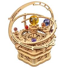 A beautifully crafted Starry Night Music Box Build Kit by Robotime, featuring intricate wooden gears, colorful gemstones, and a rotating celestial design. Ideal for DIY enthusiasts, this unique kit combines creativity and mechanical engineering for an engaging hands-on experience.