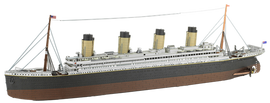 Detailed DIY model kit of the RMS Titanic by Fascinations, featuring realistic design elements such as three chimneys, deck details, and masts, showcasing the iconic ship's features in a miniature format.