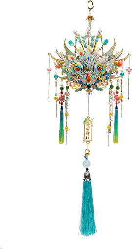 The Phoenix Coronet Qingluan by Mu Model features a vibrant and ornate design with colorful feathers, intricate floral patterns, and decorative beads, culminating in a stunning tassel. This exquisite piece adds a touch of elegance and cultural flair, perfect for showcasing in any space.