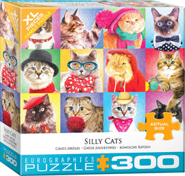 Silly Cats Large Piece Jigsaw Puzzle by Eurographics featuring a colorful design with various cats wearing funny accessories like hats, glasses, and bow ties. The box highlights 'XL Pieces' for easy handling and includes the title 'Silly Cats' along with vibrant cat illustrations.