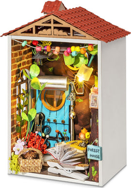 The Borrowed Garden Model Kit by Robotime features a beautifully designed miniature indoor scene resembling a cozy forest house. This DIY kit showcases vibrant decorations, including various plants, colorful lights, tools, and a charming blue door. The intricate details, such as a small basket and a creatively arranged book, contribute to a whimsical atmosphere, perfect for hobbyists and crafters looking for a fun project.