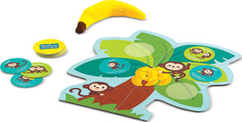 The Monkey Around: the Wiggle and Giggle Game by MindWare includes a colorful monkey-themed game board shaped like a palm tree, a plush banana, and circular cards. The cards feature playful missions and prompts for solo or group activities, encouraging movement and imagination. Perfect for family game night!