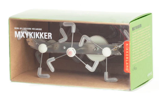 The Mxykikker Wind Up Gear Bot by Kikkerland Design Inc is a whimsical mechanical bot featuring a unique design with winding gears and a playful, insect-like appearance. Packaged in a clear box showcasing the bot's intricate mechanical features and movement capabilities.