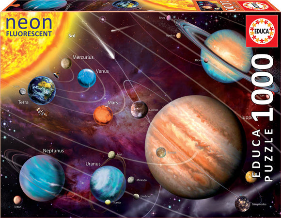 Colorful jigsaw puzzle box featuring the solar system. Illustrations include planets such as Jupiter, Mars, and Earth, with vibrant colors and celestial elements like the Sun and asteroid belts. The Educa logo is prominently displayed.