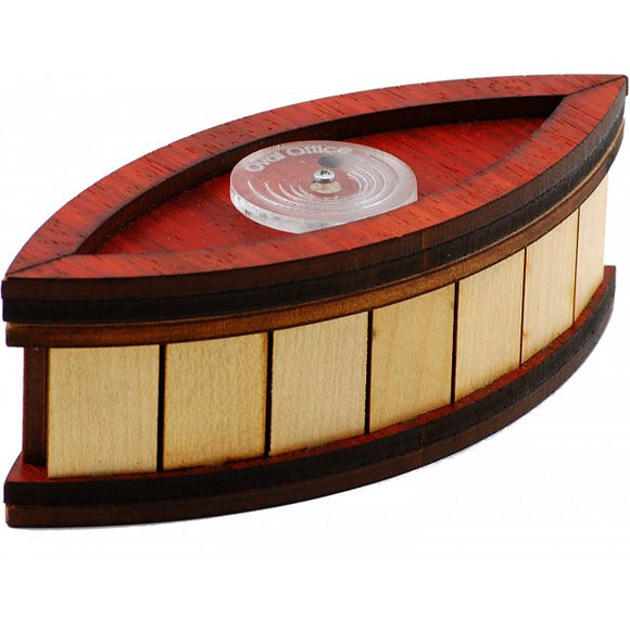 The Oval Office mechanical puzzle designed by Jean-Claude Constantin features an intricately crafted wooden structure with a smooth, oval shape. The puzzle combines red and natural wood tones, showcasing a clear circular element at the center. Ideal for puzzle enthusiasts, it challenges the mind while enhancing dexterity through engaging, hands-on play.