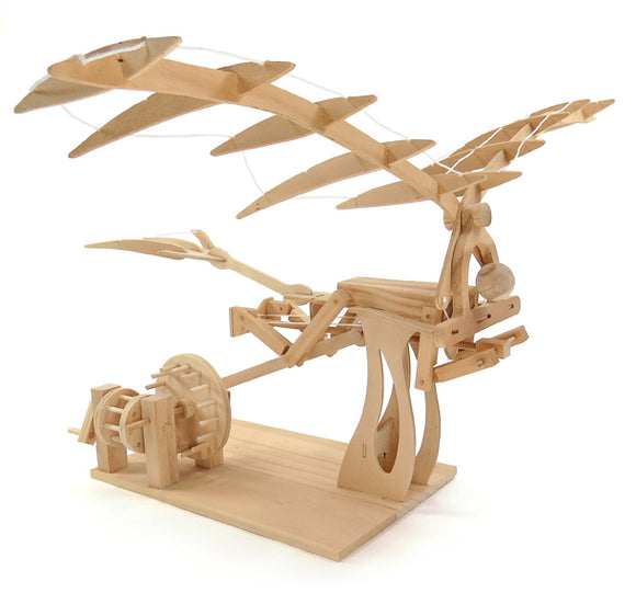 A wooden Da Vinci Ornithopter DIY kit by Pathfinders, featuring intricately designed wing mechanisms and a winding mechanism, showcasing craftsmanship and innovation. Ideal for creative minds and hobbyists.