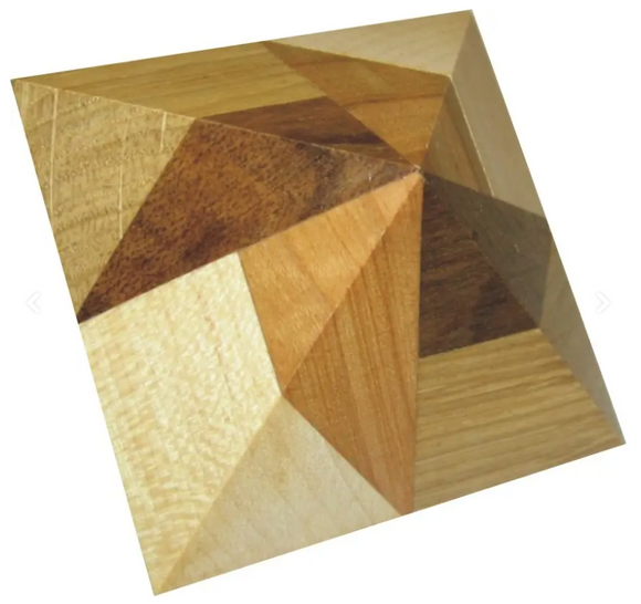 Double Pyramid mechanical puzzle by VINCO, showcasing an intricate design with alternating wooden triangles in various natural shades. The puzzle's three-dimensional geometry challenges the solver to rearrange its parts and discover its hidden mechanisms. Ideal for lovers of logic puzzles and enthusiasts seeking a stimulating brain teaser.