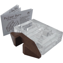 Pulsar Burr mechanical puzzle by Mr. Puzzle featuring a combination of transparent acrylic and wood elements. The puzzle includes a guide booklet explaining how to assemble the five interconnected pieces into a star-shaped configuration. The base is crafted from brown wood, while the intricate transparent components show a clever design that combines aesthetic appeal with a challenging mechanical experience.