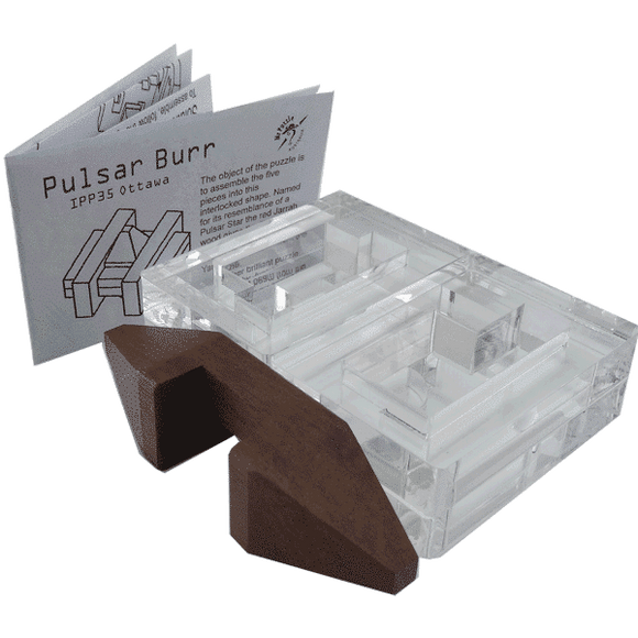 Pulsar Burr mechanical puzzle by Mr. Puzzle featuring a combination of transparent acrylic and wood elements. The puzzle includes a guide booklet explaining how to assemble the five interconnected pieces into a star-shaped configuration. The base is crafted from brown wood, while the intricate transparent components show a clever design that combines aesthetic appeal with a challenging mechanical experience.