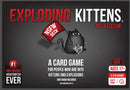 Exploding Kittens: NSFW Deck game box featuring a cartoon cat holding a red flag that reads 'NSFW Deck.' The design emphasizes humor and features playful text that reads 'A card game for people who are into kittens and explosions.' Suitable for ages 17 and older, for 2-5 players.