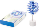 The Lollipopter Huckleberry Spin by Beyond 123 is a whimsical toy featuring a colorful spinning design. The box showcases a vibrant illustration of the toy, while the actual product consists of a vertical stand with layered discs in shades of blue, creating a mesmerizing visual effect when spun. Ideal for fidgeting or decorative display.