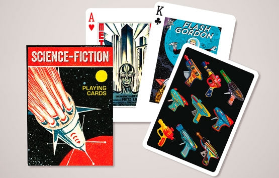 A vintage deck of playing cards featuring a Science Fiction theme. The front of the deck showcases a rocket launching towards space with the title 'SCIENCE-FICTION' in bold letters. The cards include colorful illustrations of iconic characters and sci-fi gadgets, including Flash Gordon and various space guns, enhancing their unique and playful aesthetic.
