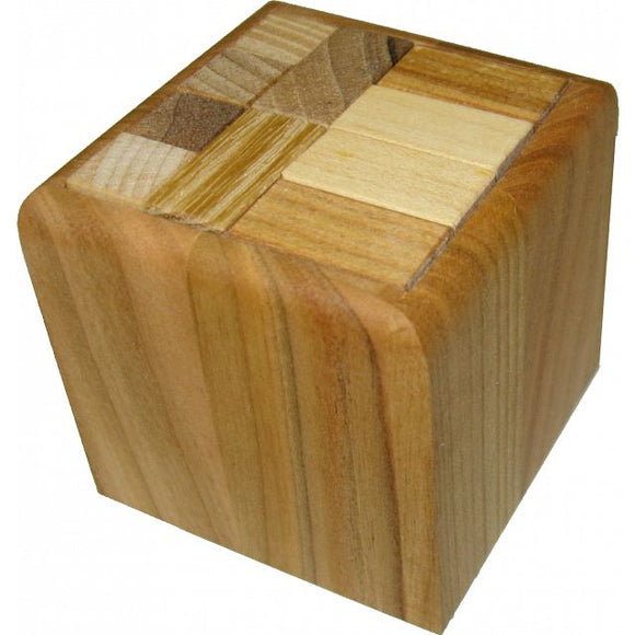 Cube Plus Mechanical puzzle by VINCO. The product is made of wood with a smooth finish, featuring various textures and wooden blocks on its surface. Ideal for puzzle enthusiasts and collectors, this mechanical puzzle challenges the mind while providing a tactile experience.