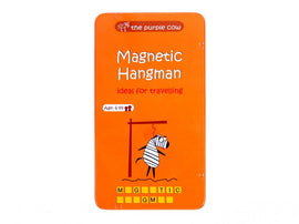Magnetic Hangman game by Purple Cow, featuring a colorful orange package with a cartoon zebra and the title 'Magnetic Hangman' prominently displayed. The game is designed for ages 6 to 99 and is labeled 'ideal for travelling.'