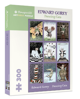Dancing Cats Jigsaw Puzzle by Pomegranate featuring whimsical illustrations by Edward Gorey. The box displays nine quirky cat characters in various playful poses and settings, suitable for puzzle enthusiasts of all ages.