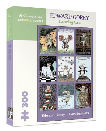 Dancing Cats Jigsaw Puzzle by Pomegranate featuring whimsical illustrations by Edward Gorey. The box displays nine quirky cat characters in various playful poses and settings, suitable for puzzle enthusiasts of all ages.