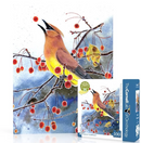Songbird with a yellow belly perched on a snowy tree branch eating a red berry