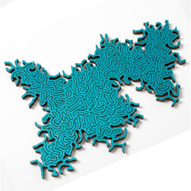 A vibrant turquoise jigsaw puzzle named Maze Infinity Puzzle by Nervous System, featuring intricate maze-like patterns that challenge the mind. The pieces have a modern design with a unique organic shape, emphasizing creativity and engagement.