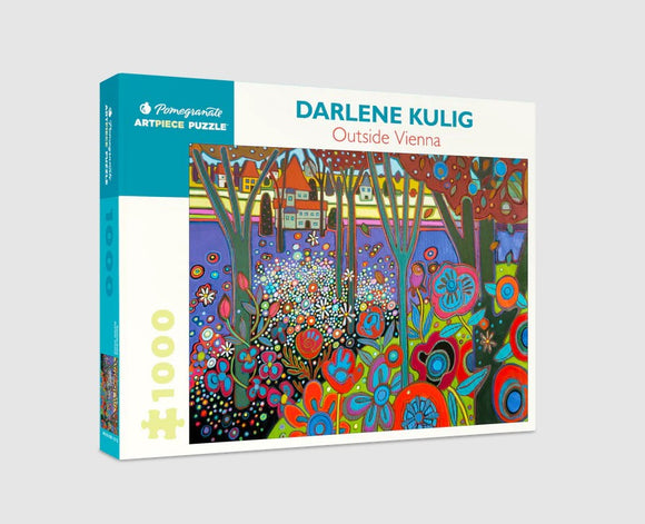 A colorful jigsaw puzzle box featuring the artwork 'Outside Vienna' by Darlene Kulig. The puzzle consists of vibrant floral designs and a picturesque landscape with trees and houses, showcasing a lively, artistic interpretation of nature.