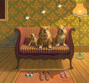 A charming jigsaw puzzle titled 'Creature Comforts' featuring three dogs—two bulldogs and one small dog—sitting on a striped couch. The background showcases a vintage wallpaper pattern and birds flying above. A cozy lamp and slippers on a rug add warmth to the scene.