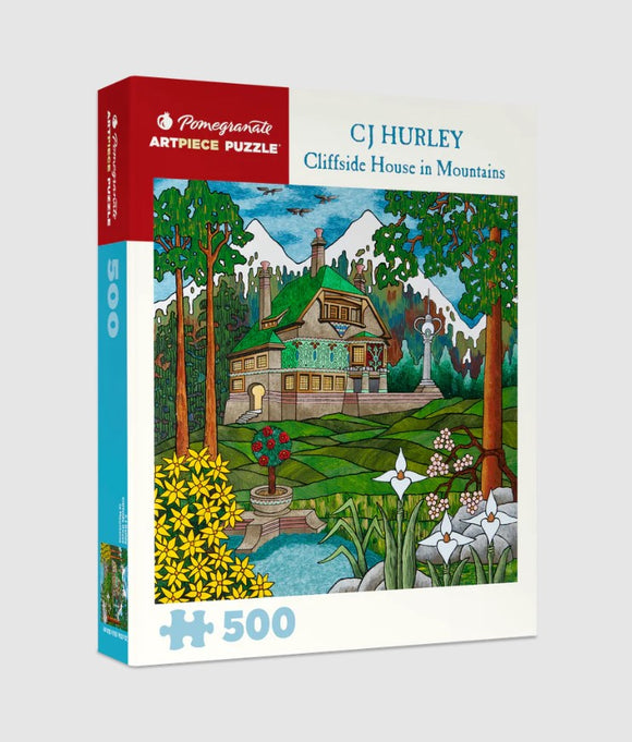 A colorful jigsaw puzzle box featuring the artwork 'Cliffside House in Mountains' by CJ Hurley. The image depicts a charming house surrounded by vibrant flowers, trees, and a serene mountain backdrop. The packaging is designed by Pomegranate and indicates that the puzzle has 500 pieces.
