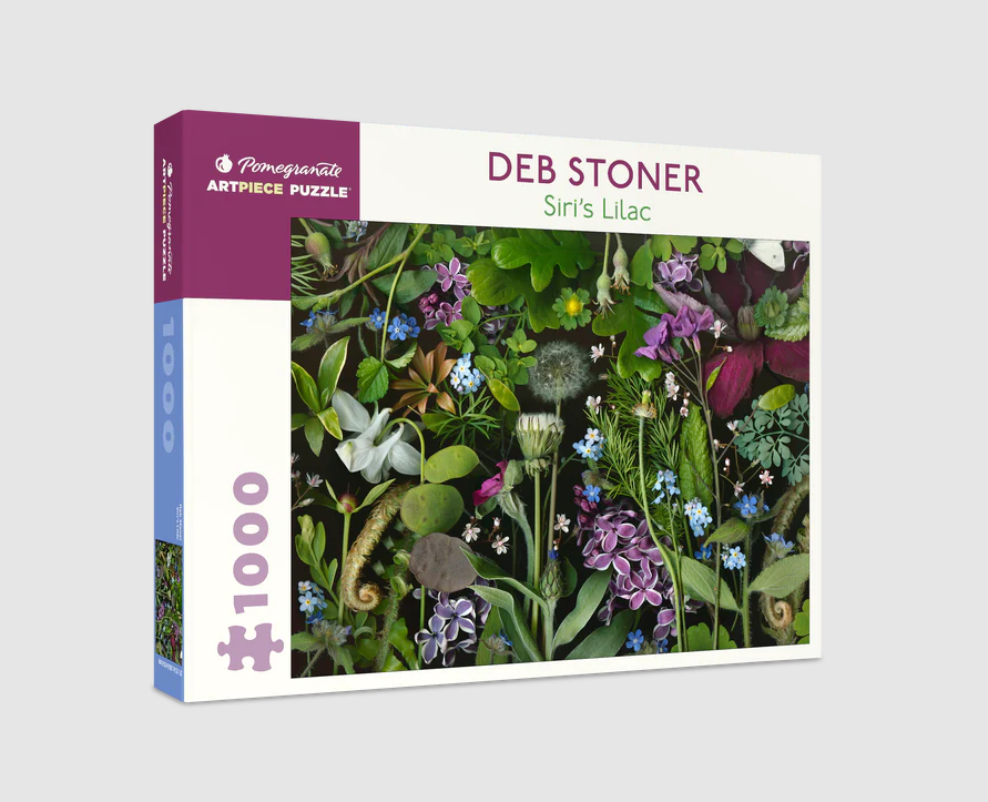 Deb Stoner: Siri's Lilac jigsaw puzzle from Pomegranate featuring a vibrant arrangement of various flowers and leaves, designed for a 1000-piece challenge.