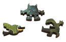 Close-up of uniquely shaped wooden jigsaw puzzle pieces featuring a bird, a whimsical creature, and a fantastical character. The pieces display vibrant colors and intricate designs, showcasing the craftsmanship of Artifact Wooden Puzzles.