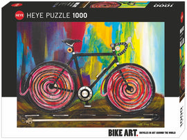 The Heye jigsaw puzzle titled 'Momentum' features a colorful, artistic depiction of a bicycle with vibrant, swirled wheels against a background of abstract colors. This 1000-piece puzzle combines creativity and a love for cycling, making it a perfect addition for art and bike enthusiasts alike.