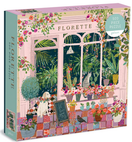 Florette jigsaw puzzle illustration featuring a charming indoor garden scene with various plants, colorful flower pots, a playful cat, a dog wearing a floral collar, and cozy decor elements. The box displays the title 'Florette' prominently with a vibrant design, inviting puzzle enthusiasts.