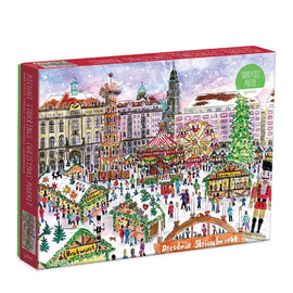 A colorful jigsaw puzzle box featuring a festive Christmas market in Dresden, depicted with a detailed illustration of market stalls, a large Christmas tree, and joyful crowds enjoying food like bratwurst. The puzzle contains 1000 pieces and is made by Galison. The artwork showcases a snowy backdrop with prominent historical buildings in different colors.
