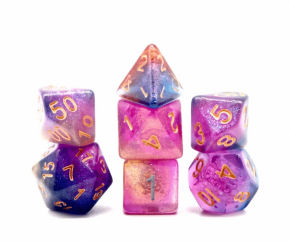 Andromeda’s Nebula Dice set by Foam Brain Games featuring a stunning array of colorful resin dice in shades of purple, pink, and blue with gold numbering. Perfect for tabletop gaming and RPGs.