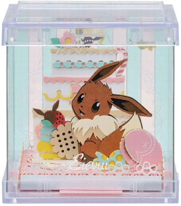 Eevee character in a decorative box with colorful elements