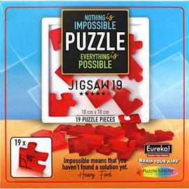 Impossible Jigsaw 19 by Eureka Belgium featuring 19 red puzzle pieces in a 10 cm x 10 cm frame. The puzzle's packaging highlights the phrase 'Nothing is impossible, everything is possible' and includes a quote from Henry Ford about finding solutions.
