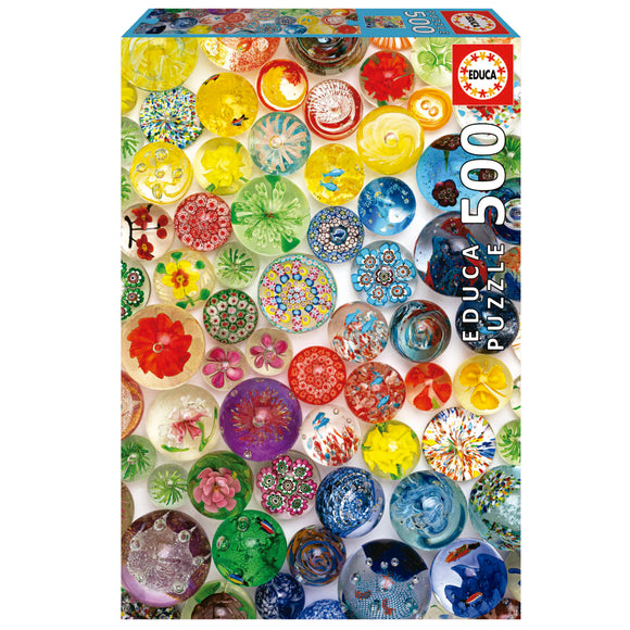 Educa DREAM BUBBLES jigsaw puzzle packaging featuring a vibrant array of colorful decorative bubbles and flowers in various shapes and designs. The box displays a total of 500 pieces, inviting puzzlers to immerse themselves in a fun and engaging activity.