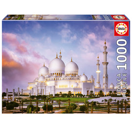 Educa jigsaw puzzle featuring the Sheikh Zayed Grand Mosque, showcasing its stunning white domes and minarets against a picturesque sky. The puzzle includes 1000 pieces perfect for both adults and children, offering a rewarding challenge and beautiful visuals once completed.