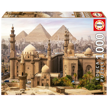 Educa jigsaw puzzle featuring a stunning view of Cairo, Egypt, with the Pyramids in the background and intricate architectural details of historic buildings. The puzzle consists of 1000 pieces, providing a challenging and rewarding experience for puzzle enthusiasts.