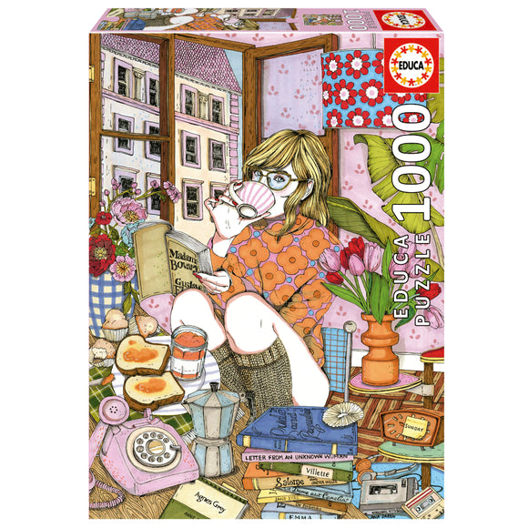 The box of the Educa jigsaw puzzle titled 'TIME FOR MYSELF', featuring a cozy illustration of a girl enjoying tea and reading a book among colorful decor and cheerful flowers. The setting includes a stack of books, a retro telephone, and delicious snacks, encapsulating a serene moment of personal time. The puzzle consists of 1000 pieces, designed to provide a relaxing and enjoyable experience.