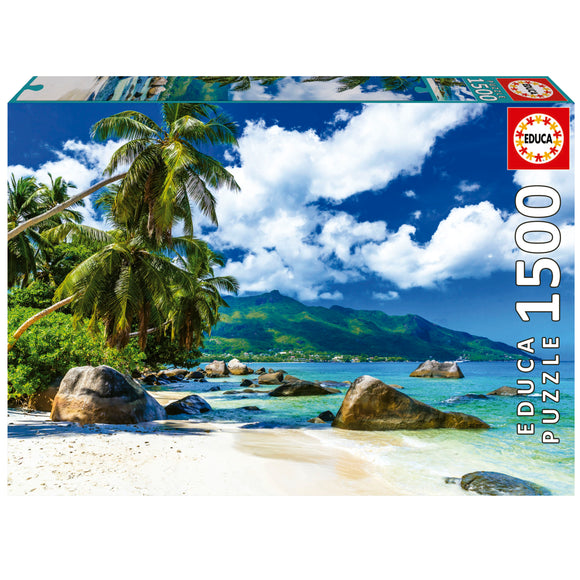 Educa Seychelles jigsaw puzzle featuring a scenic beach landscape with palm trees, clear blue water, and rocky formations. The puzzle consists of 1500 pieces and captures a vibrant tropical scene, perfect for puzzle enthusiasts and nature lovers.