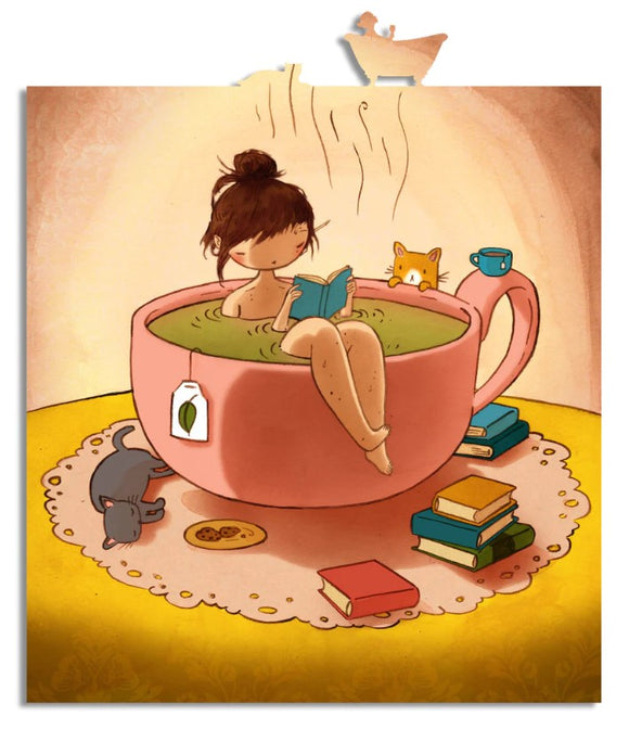 A whimsical jigsaw puzzle titled 'Tea Bath' by Stasia Burrington featuring a girl relaxing in a giant pink teacup filled with green tea while reading a book. A curious cat and an orange fox keep her company, surrounded by colorful books and a cookie on a decorative rug.