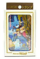 Castle in the Sky Playing Cards featuring vibrant characters from Studio Ghibli. The artistic design showcases a scene with a boy and a girl in a fantastical setting, highlighting the imaginative theme of the game. The packaging is elegantly designed with clear card identifiers and branding.